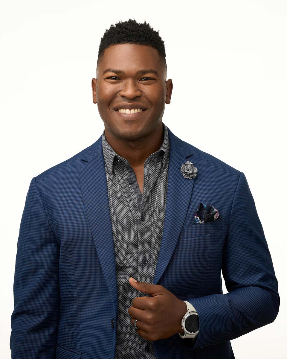 Man blue suit white background professional headshot NYC