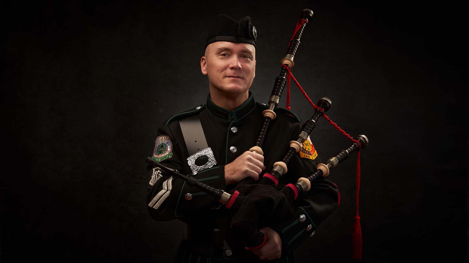 Man bagpipes traditional uniform cultural music NYC