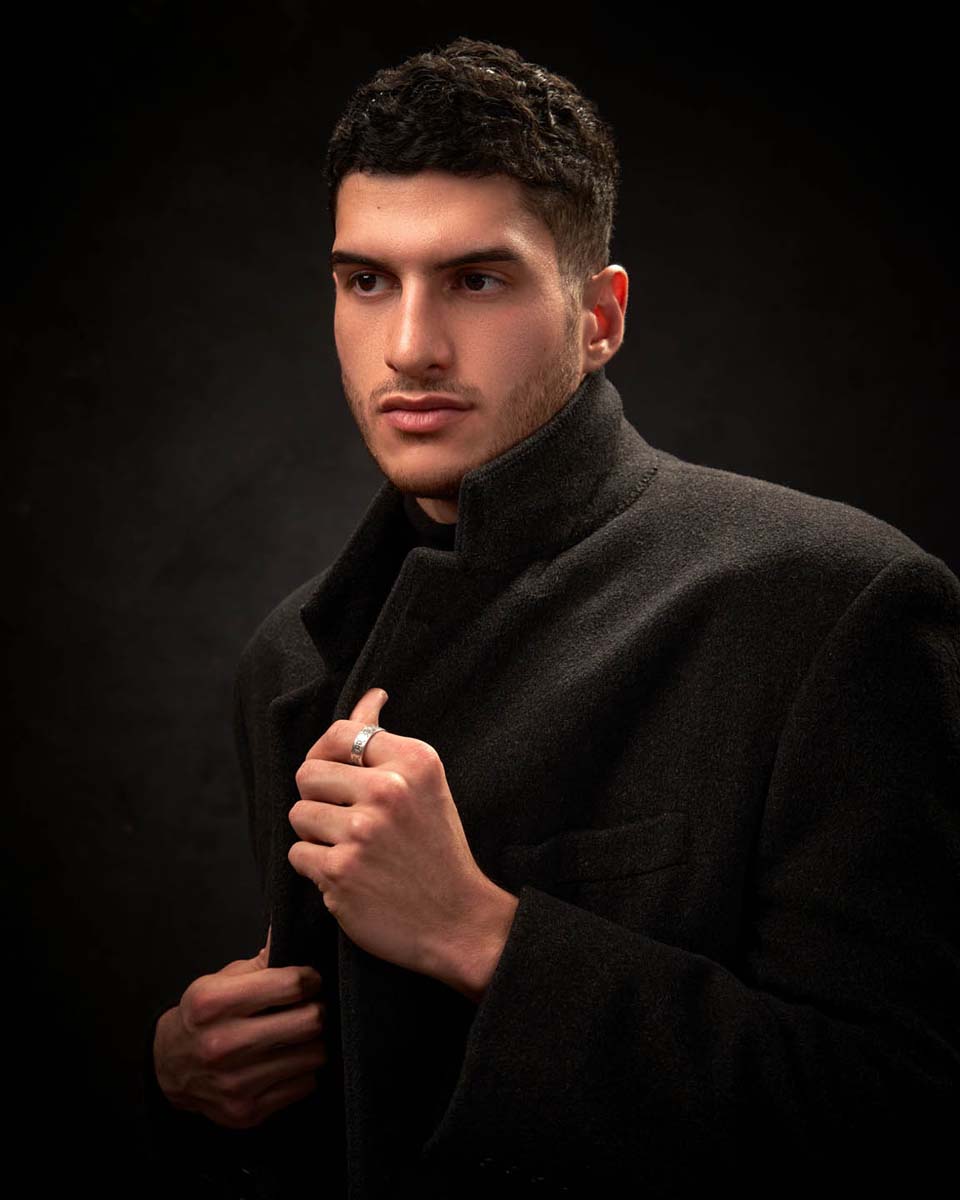 Man black coat turtleneck editorial fashion portrait NYC