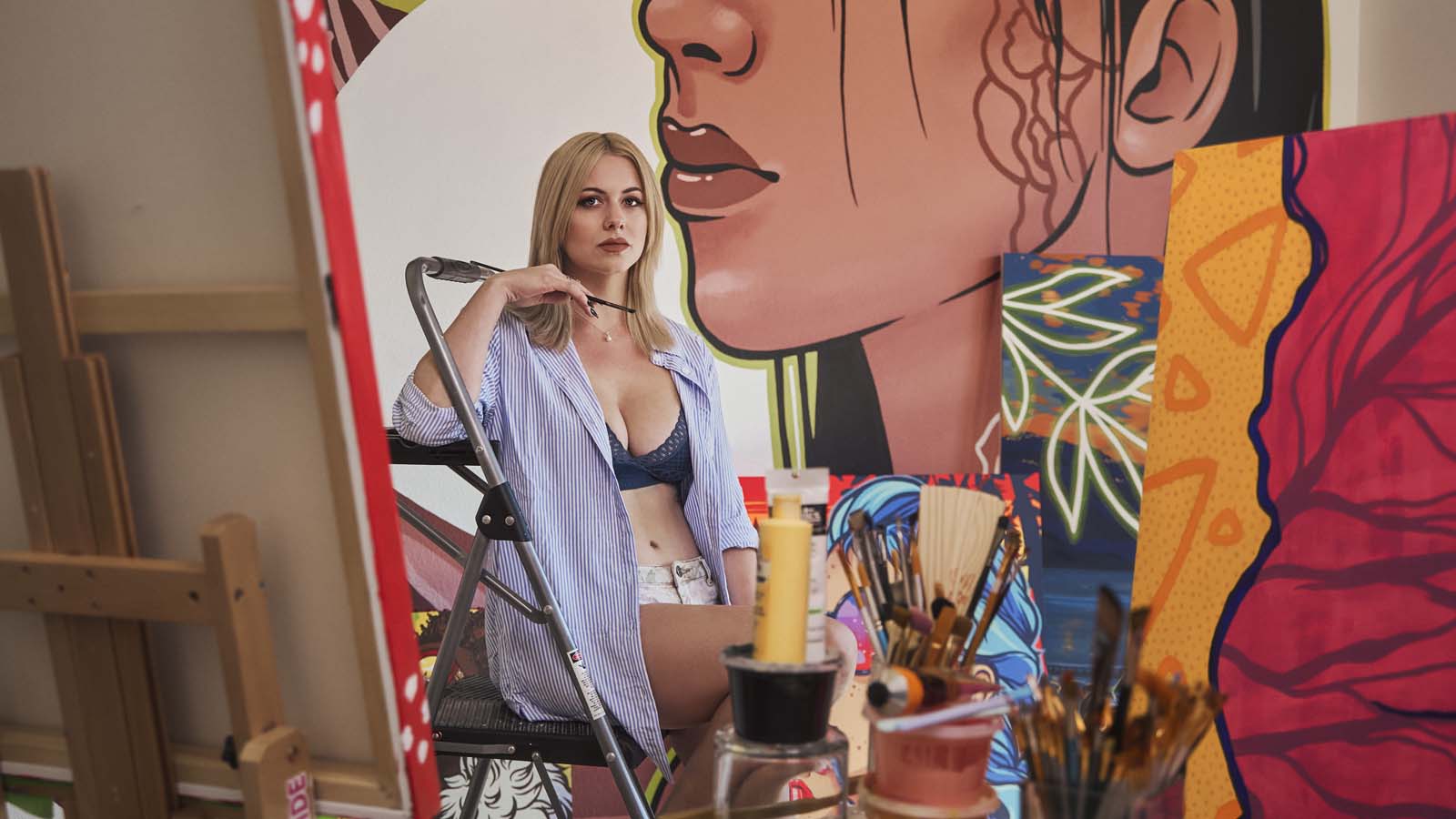 Female artist painter in studio NYC creative photography